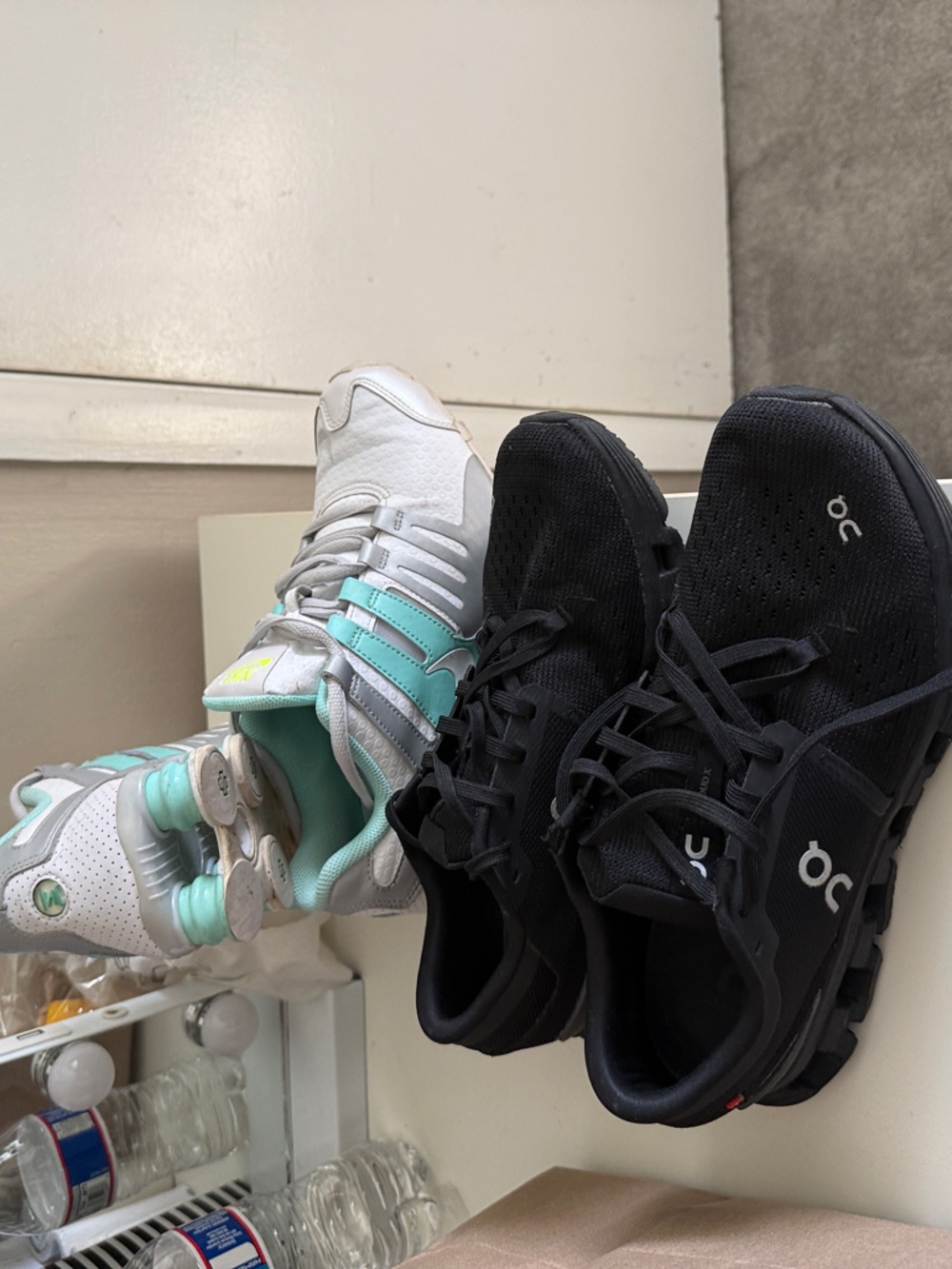 On Running Kids Black Pair and White Sneakers with Mint Accents